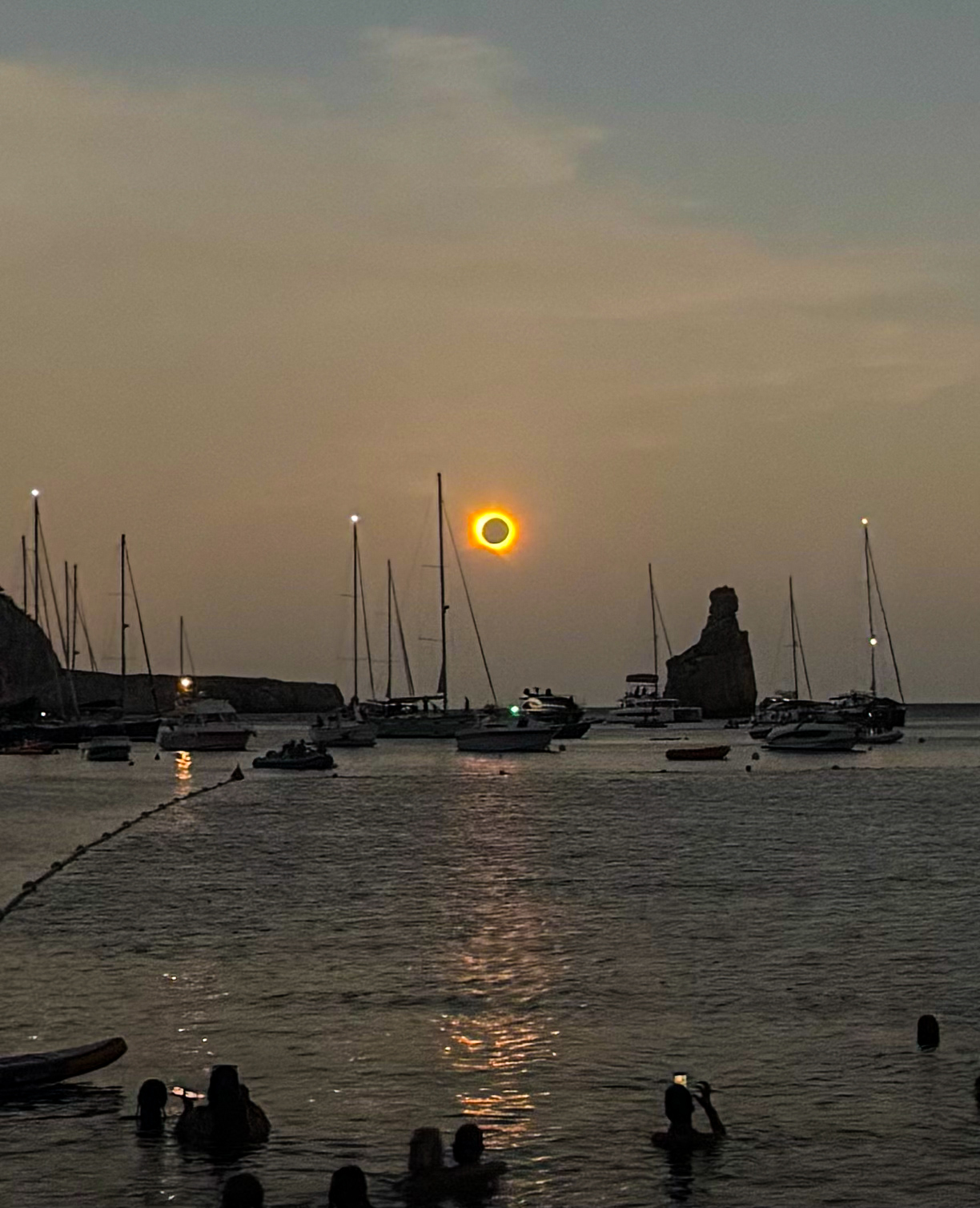 Solar eclipse over Benirràs Beach